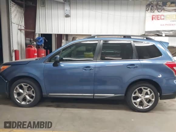 2015 Subaru Forester Touring with VIN JF2SJAUC9FH807385, listed as a IAAI auction lot 43508096 with 103,862 mi miles and . Bid and sale history available at DreamBid. Image 15.