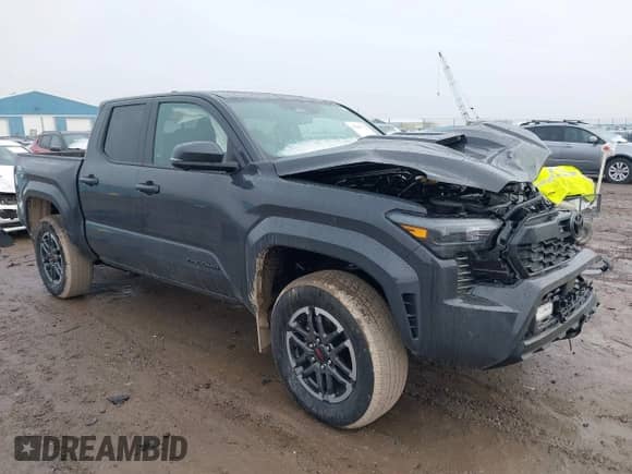 2024 Toyota Tacoma SR5 with VIN 3TMLB5JNXRM055645, listed as a IAAI auction lot 41208771 with 984 mi miles and . Bid and sale history available at DreamBid. Image 1.