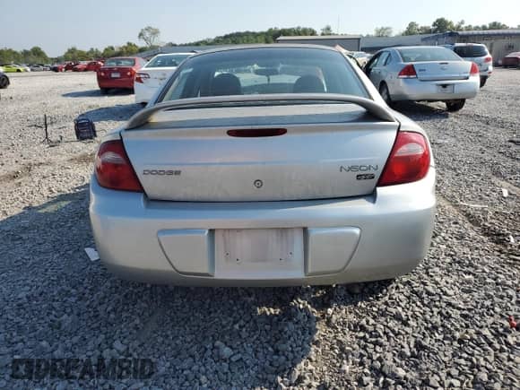 2004 Dodge Neon SXT with VIN 1B3ES56C94D560985, listed as a Copart auction lot 71305465 with 44,077 mi miles and Salvage title. Bid and sale history available at DreamBid. Image 6.