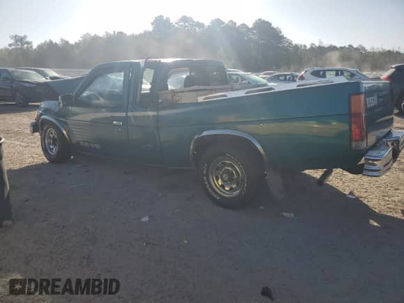 1995 Nissan Frontier XE with VIN 1N6HD16SXSC392683, listed as a Copart auction lot 59881434 with 391,479 mi miles and Salvage title. Bid and sale history available at DreamBid. Image 2.