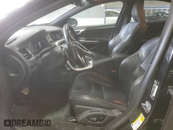 2015 Volvo S60 T6 Drive-E with VIN YV149MFK2F2351331, listed as a Copart auction lot 69287175 with 126,628 mi miles and Salvage title. Bid and sale history available at DreamBid. Image 7.