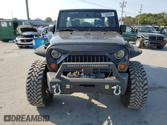 2007 Jeep Wrangler Unlimited X с VIN 1J4GA39177L167919, выставлен на аукционе Copart как лот 71595545 с пробегом 159 990 миль миль и Списание • Salvage title. История ставок и продаж доступна на DreamBid. Изображение 5.