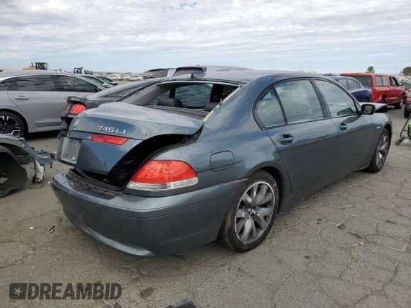 2004 BMW 7 Series 745Li with VIN WBAGN63474DS48436, listed as a Copart auction lot 67040804 with 133,432 mi miles and Salvage title. Bid and sale history available at DreamBid. Image 3.