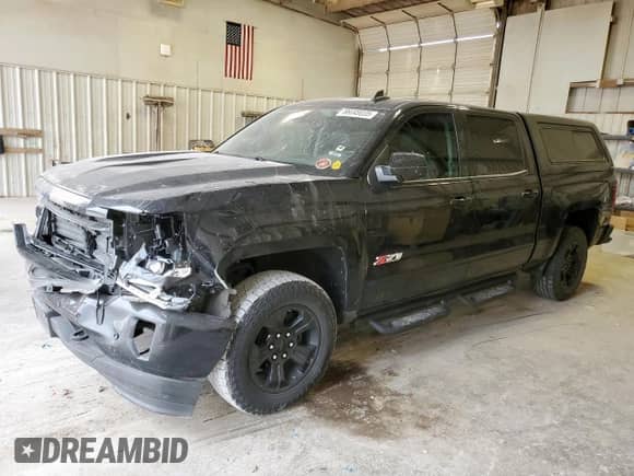 2018 Chevrolet Silverado 1500 LTZ z VIN 3GCUKSEJ5JG635964, wystawiony jako Copart lot #86049035 z przebiegiem 179 676 mil mil oraz Szkoda całkowita • Salvage title. Historia ofert i sprzedaży dostępna na DreamBid. Obrazek 1.