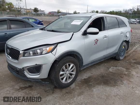 2018 Kia Sorento L with VIN 5XYPG4A35JG432248, listed as a IAAI auction lot 41534103 with 126,322 mi miles and . Bid and sale history available at DreamBid. Image 2.