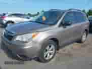 2014 Subaru Forester Premium with VIN JF2SJACC4EG405795, listed as a IAAI auction lot 42762451 with 267,393 mi miles and . Bid and sale history available at DreamBid. Image 2.