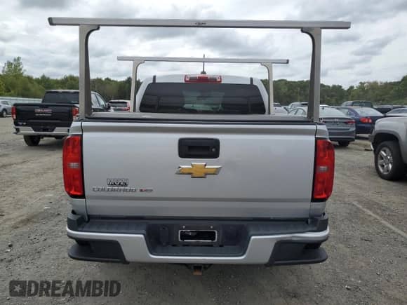 2018 Chevrolet Colorado 4WD Work Truck with VIN 1GCGTBEN9J1121613, listed as a Copart auction lot 71680335 with 76,617 mi miles and Salvage title. Bid and sale history available at DreamBid. Image 6.