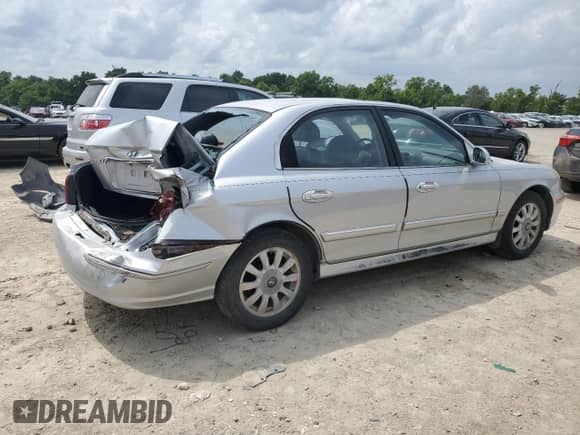 2003 Hyundai Sonata GLS z VIN KMHWF35H43A856971, wystawiony jako Copart lot #63772225 z przebiegiem 149 568 mil mil oraz Szkoda całkowita • Salvage title. Historia ofert i sprzedaży dostępna na DreamBid. Obrazek 3.