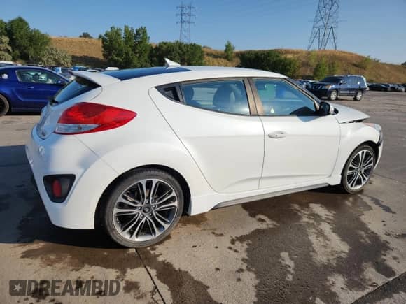 2016 Hyundai Veloster Turbo с VIN KMHTC6AE8GU295171, выставлен на аукционе Copart как лот 71407595 с пробегом 72 818 миль миль и Списание • Salvage title. История ставок и продаж доступна на DreamBid. Изображение 3.
