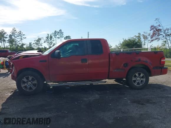2006 Ford F-150 STX with VIN 1FTRX02W56KB85566, listed as a IAAI auction lot 43142579 with 210,437 mi miles and . Bid and sale history available at DreamBid. Image 14.