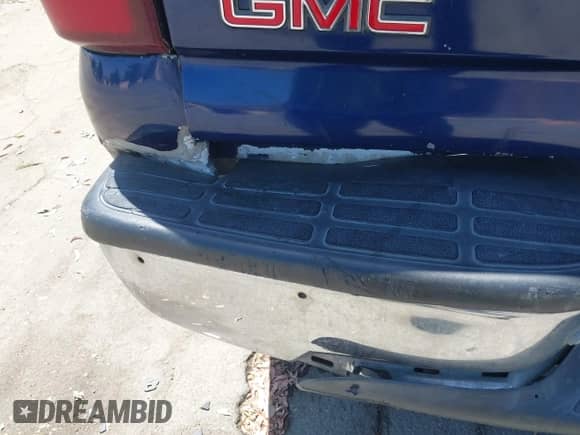 2001 GMC Sierra 1500 SLE z VIN 2GTEC19V611272933, wystawiony jako IAAI lot #42509221 z przebiegiem 298 443 mil mil oraz . Historia ofert i sprzedaży dostępna na DreamBid. Obrazek 13.