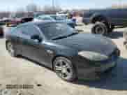 2008 Hyundai Tiburon GT z VIN KMHHN66F18U286993, wystawiony jako Copart lot #48743215 z przebiegiem 181 936 mil mil oraz Szkoda całkowita • Salvage title. Historia ofert i sprzedaży dostępna na DreamBid. Obrazek 4.