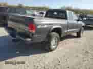 2003 Dodge Dakota с VIN 1D7HG12XX3S110986, выставлен на аукционе Copart как лот 77675734 с пробегом 108 529 миль миль и Списание • Salvage title. История ставок и продаж доступна на DreamBid. Изображение 3.