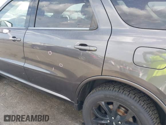 2019 Dodge Durango GT with VIN 1C4RDJDG5KC606601, listed as a IAAI auction lot 42133390 with 85,698 mi miles and . Bid and sale history available at DreamBid. Image 21.