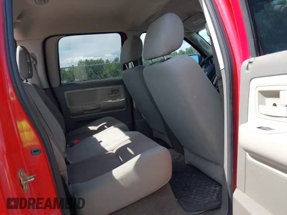 2005 Dodge Dakota SLT with VIN 1D7HW48N55S104123, listed as a IAAI auction lot 42828730 with 141,913 mi miles and . Bid and sale history available at DreamBid. Image 8.