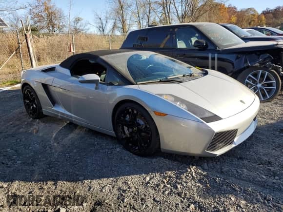 2007 Lamborghini Gallardo с VIN ZHWGU22T57LA05137, выставлен на аукционе Copart как лот 78841294 с пробегом 5 504 миль миль и Списание • Salvage title. История ставок и продаж доступна на DreamBid. Изображение 4.