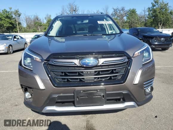 2024 Subaru Forester Touring z VIN JF2SKAMCXRH443642, wystawiony jako Copart lot #69770275 z przebiegiem 14 197 mil mil oraz Szkoda całkowita • Salvage title. Historia ofert i sprzedaży dostępna na DreamBid. Obrazek 5.