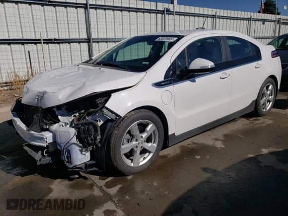 2015 Chevrolet Volt z VIN 1G1RA6E49FU106511, wystawiony jako Copart lot #63620903 z przebiegiem 76 716 mil mil oraz . Historia ofert i sprzedaży dostępna na DreamBid. Obrazek 1.