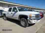 2004 GMC Sierra 1500 SLT with VIN 2GTEK13T241352227, listed as a Copart auction lot 46681935 with 150,944 mi miles and Salvage title. Bid and sale history available at DreamBid. Image 4.