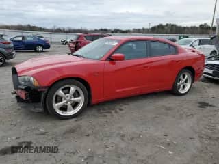 2011 Dodge Charger Road/Track with VIN 2B3CL5CT7BH513270, listed as a Copart auction lot 36925684 with 104,859 mi miles and Salvage title. Bid and sale history available at DreamBid. Image 1.