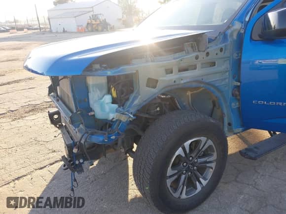 2021 Chevrolet Colorado 4WD Z71 z VIN 1GCGTDEN6M1264115, wystawiony jako IAAI lot #41667276 z przebiegiem 31 304 mil mil oraz . Historia ofert i sprzedaży dostępna na DreamBid. Obrazek 6.