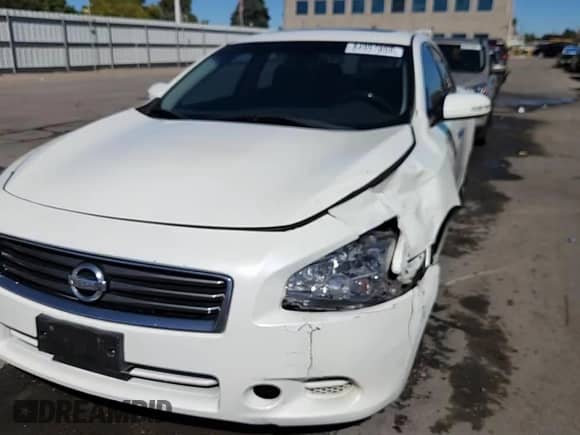 2013 Nissan Maxima SV with VIN 1N4AA5AP4DC820375, listed as a Copart auction lot 84957855 with 140,746 mi miles and Salvage title. Bid and sale history available at DreamBid. Image 13.