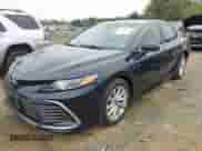 2021 Toyota Camry LE with VIN 4T1C11AK8MU548158, listed as a IAAI auction lot 43333222 with 34,824 mi miles and . Bid and sale history available at DreamBid. Image 2.