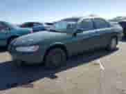 1999 Toyota Camry LE z VIN JT2BG28KXX0359137, wystawiony jako Copart lot #85011045 z przebiegiem 158 951 mil mil oraz Czysty tytuł • Clean title. Historia ofert i sprzedaży dostępna na DreamBid. Obrazek 1.