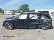 2018 Honda Pilot Touring z VIN 5FNYF6H95JB052993, wystawiony jako IAAI lot #43356643 z przebiegiem Nie podano mil oraz . Historia ofert i sprzedaży dostępna na DreamBid. Obrazek 13.