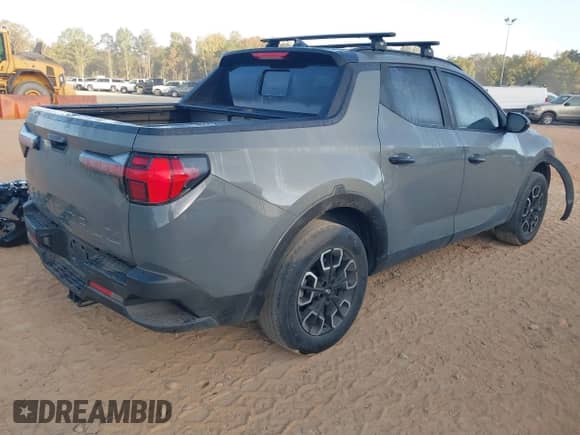 2022 Hyundai Santa Cruz SEL with VIN 5NTJC4AE5NH030586, listed as a IAAI auction lot 40754440 with 68,639 mi miles and . Bid and sale history available at DreamBid. Image 4.