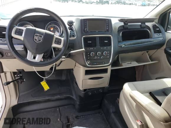 2016 Dodge Grand Caravan SXT with VIN 2C4RDGCG3GR396650, listed as a Copart auction lot 66267745 with 20,690 mi miles and Salvage title. Bid and sale history available at DreamBid. Image 8.