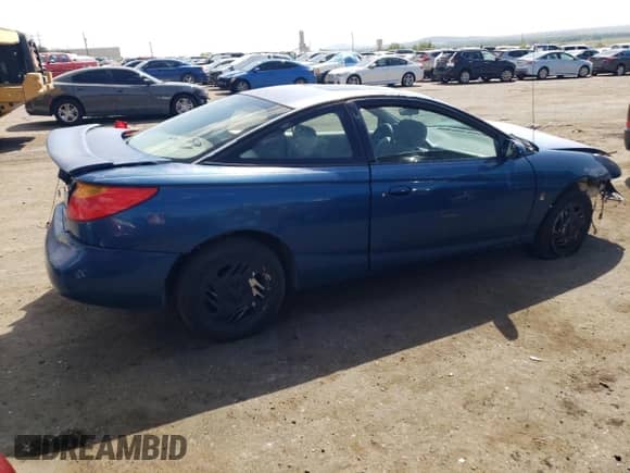 2001 Saturn SC с VIN 1G8ZR12731Z256766, выставлен на аукционе Copart как лот 70595904 с пробегом Не указан миль и Списание • Salvage title. История ставок и продаж доступна на DreamBid. Изображение 3.