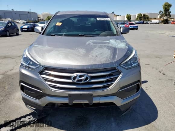 2017 Hyundai Santa Fe 2.4L с VIN 5NMZT3LB3HH019067, выставлен на аукционе Copart как лот 68940165 с пробегом 123 476 миль миль и Списание • Salvage title. История ставок и продаж доступна на DreamBid. Изображение 5.