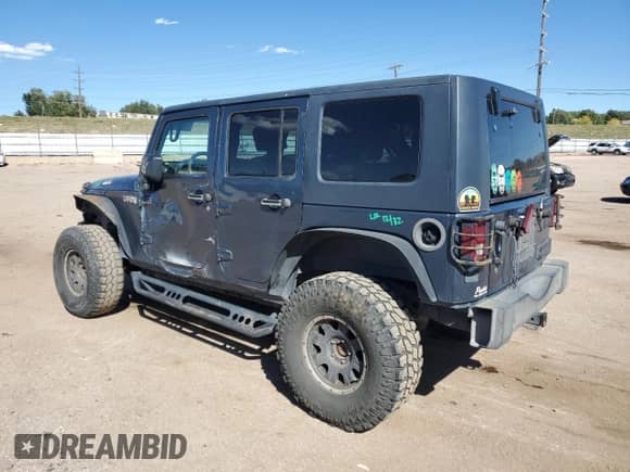 2007 Jeep Wrangler Unlimited Sahara z VIN 1J4GA59127L101693, wystawiony jako Copart lot #84449745 z przebiegiem 226 790 mil mil oraz Szkoda całkowita • Salvage title. Historia ofert i sprzedaży dostępna na DreamBid. Obrazek 2.