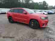 2021 Jeep Grand Cherokee Trackhawk z VIN 1C4RJFN94MC756921, wystawiony jako Copart lot #70144575 z przebiegiem 43 736 mil mil oraz Szkoda całkowita • Salvage title. Historia ofert i sprzedaży dostępna na DreamBid. Obrazek 4.