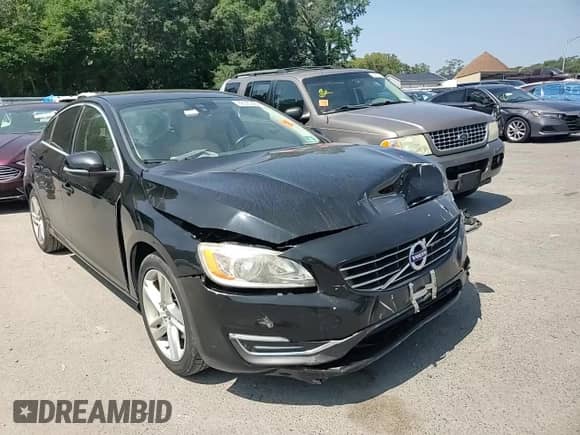 2015 Volvo S60 T5 Drive-E Premier with VIN YV140MFK6F2336518, listed as a Copart auction lot 68339405 with 142,401 mi miles and Salvage title. Bid and sale history available at DreamBid. Image 13.
