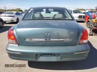 2002 Hyundai XG L with VIN KMHFU45E12A225689, listed as a Copart auction lot 73006754 with 182,430 mi miles and Salvage title. Bid and sale history available at DreamBid. Image 6.