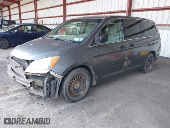 2010 Honda Odyssey LX with VIN 5FNRL3H22AB046762, listed as a IAAI auction lot 42848890 with 222,984 mi miles and . Bid and sale history available at DreamBid. Image 2.