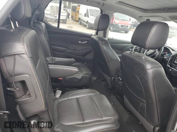 2018 Chevrolet Traverse Premier z VIN 1GNERKKW9JJ100786, wystawiony jako Copart lot #71393895 z przebiegiem 162 859 mil mil oraz Szkoda całkowita • Salvage title. Historia ofert i sprzedaży dostępna na DreamBid. Obrazek 10.