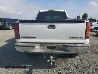 2002 Chevrolet Silverado 1500HD LS with VIN 1GCGC13U22F115497, listed as a Copart auction lot 66585824 with 211,687 mi miles and Salvage title. Bid and sale history available at DreamBid. Image 6.