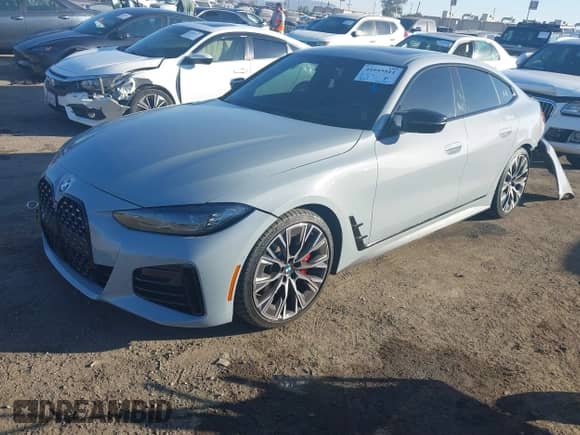 2023 BMW 4 Series M440i с VIN WBA63AW05PFP60184, выставлен на аукционе IAAI как лот 41045811 с пробегом 12 141 миль миль и . История ставок и продаж доступна на DreamBid. Изображение 2.