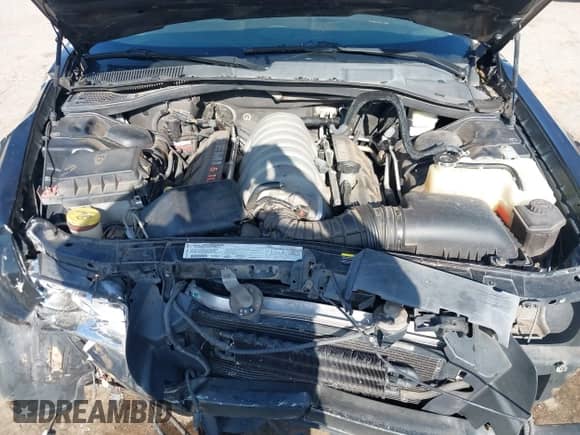 2006 Chrysler 300 C SRT-8 with VIN 2C3LA73W66H219444, listed as a IAAI auction lot 42540028 with 199,913 mi miles and . Bid and sale history available at DreamBid. Image 10.