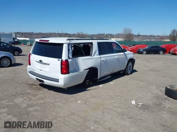 2016 Chevrolet Suburban LS z VIN 1GNSKGEC7GR276512, wystawiony jako IAAI lot #41892524 z przebiegiem 182 659 mil mil oraz . Historia ofert i sprzedaży dostępna na DreamBid. Obrazek 4.