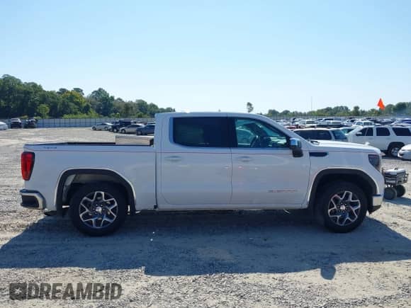 2023 GMC Sierra 1500 SLE with VIN 3GTPUBEK9PG291175, listed as a IAAI auction lot 43157724 with 40,405 mi miles and . Bid and sale history available at DreamBid. Image 13.