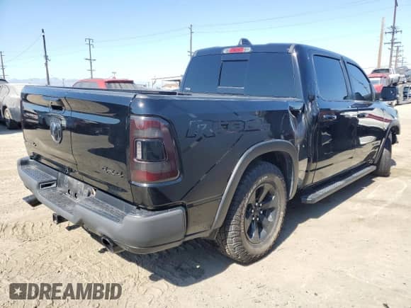 2020 Ram 1500 Rebel z VIN 1C6SRFLT0LN265734, wystawiony jako Copart lot #68314085 z przebiegiem 62 838 mil mil oraz Szkoda całkowita • Salvage title. Historia ofert i sprzedaży dostępna na DreamBid. Obrazek 3.