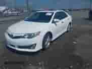 2014 Toyota Camry SE with VIN 4T1BF1FKXEU856388, listed as a IAAI auction lot 42256342 with 193,204 mi miles and . Bid and sale history available at DreamBid. Image 17.