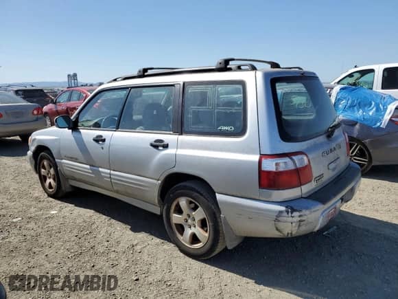 2002 Subaru Forester S with VIN JF1SF65612H743803, listed as a Copart auction lot 58748725 with 67,381 mi miles and Clean title. Bid and sale history available at DreamBid. Image 2.