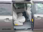 2012 Toyota Sienna with VIN 5TDKA3DC9CS013553, listed as a IAAI auction lot 42096137 with 181,993 mi miles and . Bid and sale history available at DreamBid. Image 8.