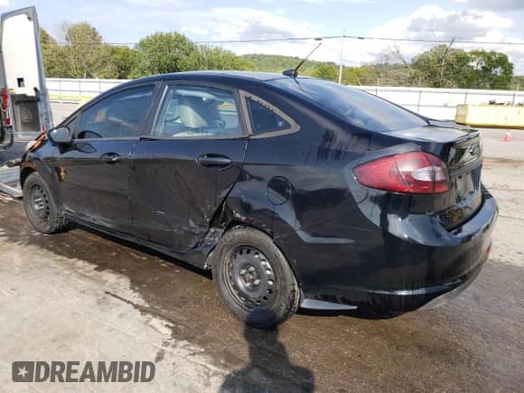 2012 Ford Fiesta S with VIN 3FADP4AJ8CM121345, listed as a Copart auction lot 70723125 with 113,935 mi miles and Salvage title. Bid and sale history available at DreamBid. Image 2.