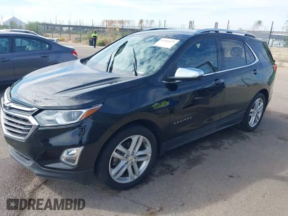 2020 Chevrolet Equinox Premier z VIN 2GNAXPEX0L6132001, wystawiony jako IAAI lot #43353271 z przebiegiem 110 017 mil mil oraz . Historia ofert i sprzedaży dostępna na DreamBid. Obrazek 2.